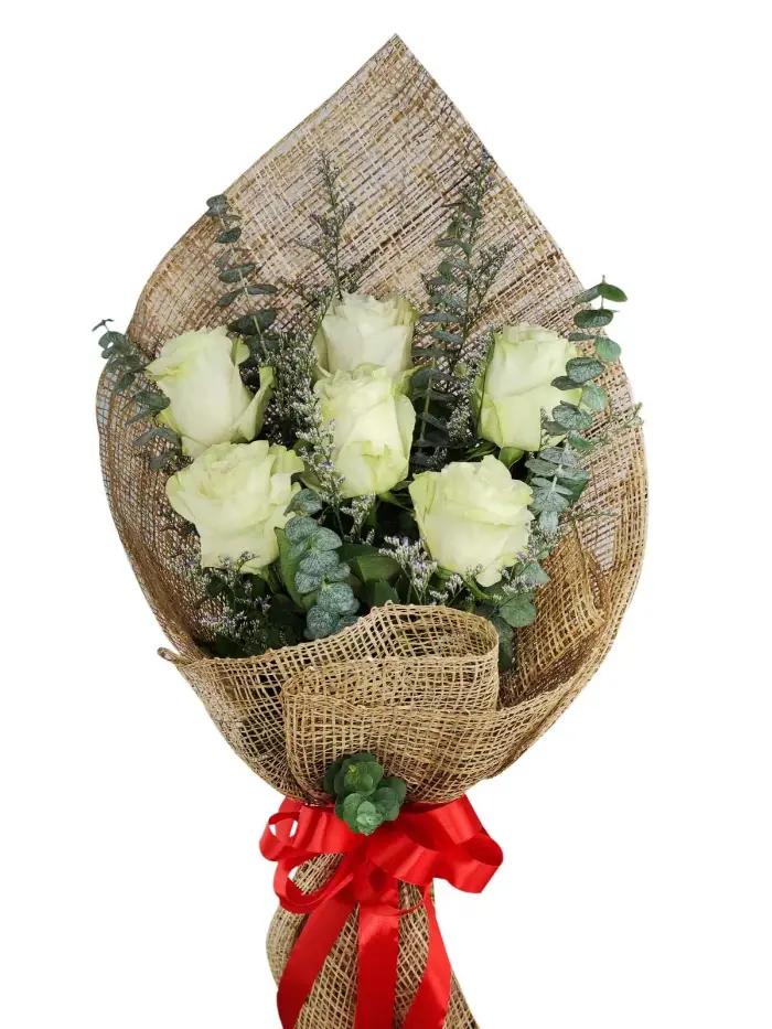 6 stem white Ecuadorian roses bouquet with burlap wrapping and eucalyptus