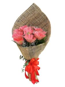 10 Stem Pink Gerbera with imported Misty Blue, silver dollar eucalyptus, and local rosal leaves for delivery in San Perfecto, San Juan City.