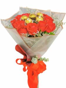 red flower and chocolates flower bouquet