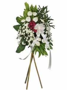 Elegant white and purple sympathy flower arrangement with Radus Mums, Anthurium and Carnations for funeral delivery in Bulacan